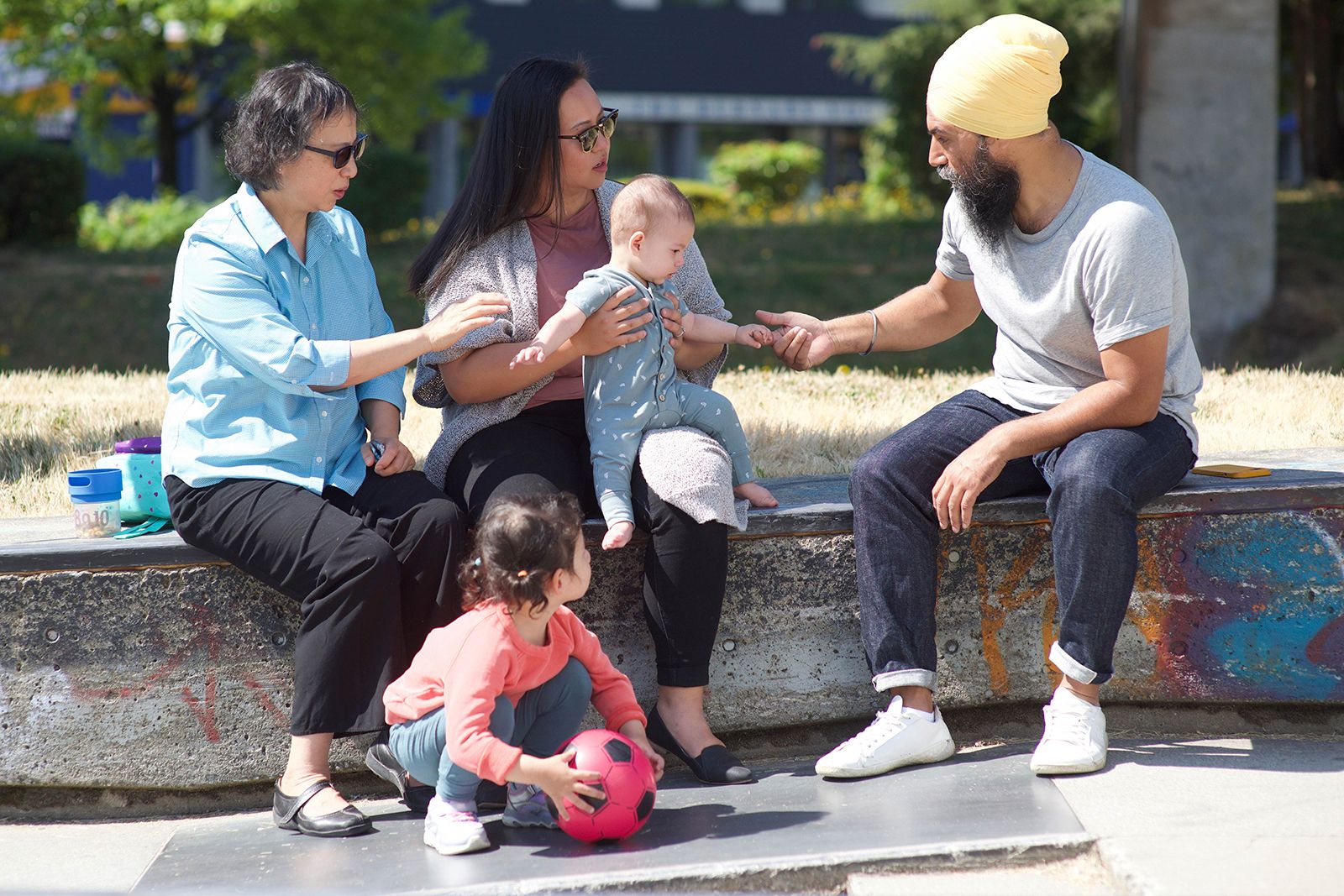 Jagmeet Singh talks to a family